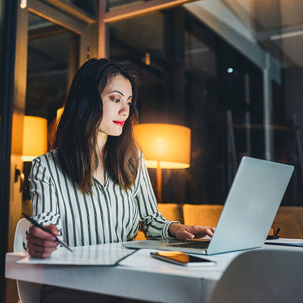 Woman Watching the Conference videos at night